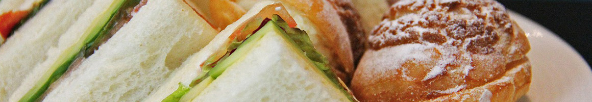 Eating Deli Sandwich at Needs Deli | Merchantile restaurant in Bellevue, WA.